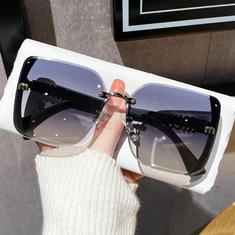 Luxury Rimless Sunglasses Women Vintage UV400 Anti-Glare Designer Shades"